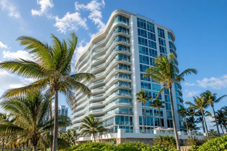 Modern coastal condominium tower representing high-value Florida condo association reserve accounts